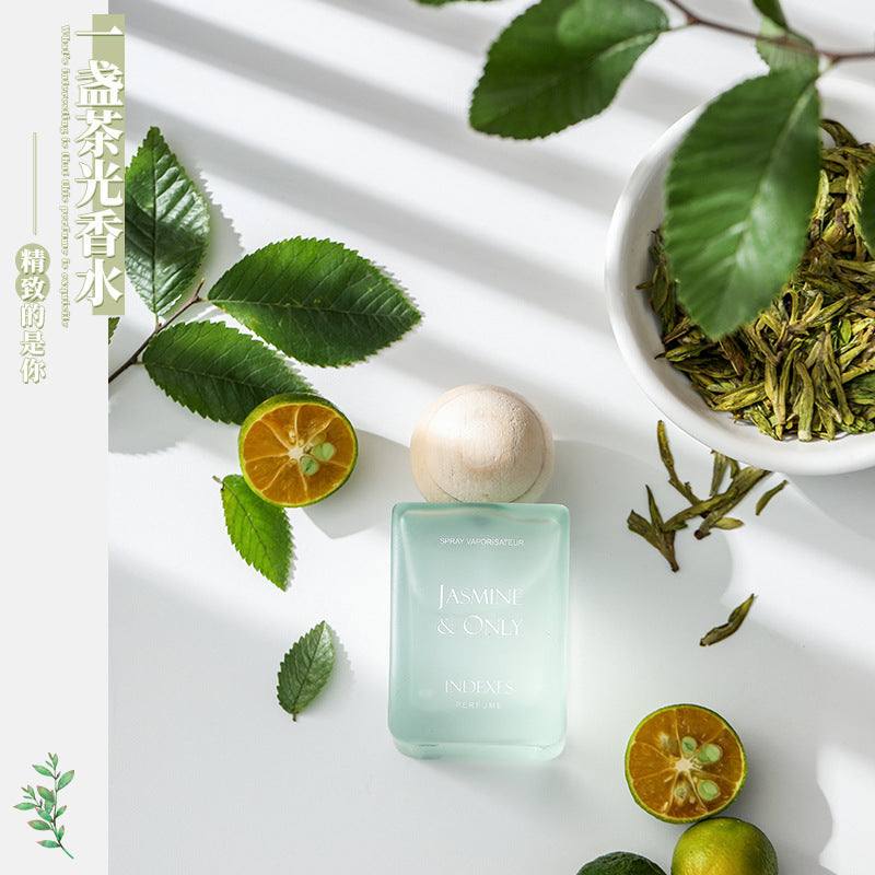 Here’s an SEO-friendly **image alt text** using the focus keyword naturally:  **Alt text:** *Fresh Tea Reverie premium loose leaf tea with fresh leaves and calming aroma*
